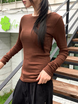 Tatin back buckle strap slit long sleeve t-shirt