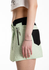 アシメトリックボタンミニスカート / ASYMMETRIC BUTTON MINI SKIRT (MIXED FABRIC)