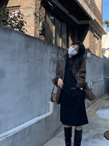 Ancient buckle midi skirt