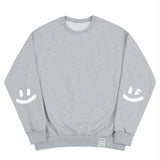 エルボー スプレー ドット スマイル ドローイング スウェットシャツ / Elbow Spray Smile Drawing Sweatshirt