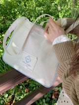 me abrace Canvas embroidered shoulder bag
