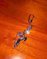 ピアスクロススネークキーチェーン / Pierced cross snake keychain