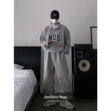 Huke x Nus. half zip-up