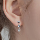 touch heart earring