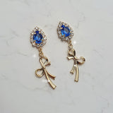 ロイヤルブルークリスタルアンドゴールドリボンピアス / Royal Blue Crystal and Gold Ribbon Piercing