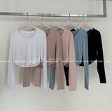 It's soft. A long-sleeved cropped shirt