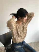 Freewheeling tassel round knit 