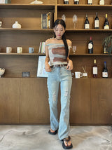 Belted light blue bootcut denim pants