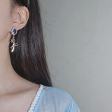 ロイヤルブルークリスタルアンドゴールドリボンピアス / Royal Blue Crystal and Gold Ribbon Piercing