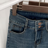 Whiskered Two-Button High Waist Skinny Jeans