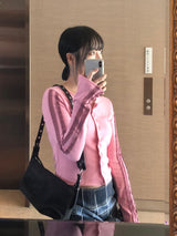 Tracking cardigan