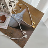 hiv パールハートキッチュネックレス/hiv Pearl heart kitsch necklace (2color)
