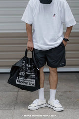 タイベック®ウォータープルーフライトウェイトハンドバッグ (ハズ アジャスタブル ショルダーストラップ) / Tyvek®Waterproof Lightweight Handbag (has adjustable shoulder strap)