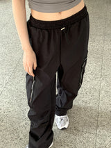 アコンジッパーポケットナイロンワイドツーウェイジョガーパンツ/ Acorn Zip Pocket Nylon Wide Two Way Joggers