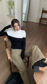 Black and white cut knit top