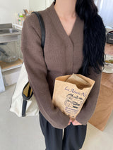Bear hidden button cardigan