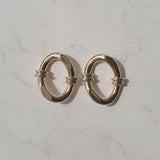 ノッティドオーバルリングピアス