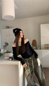 Black off-the-shoulder backless top