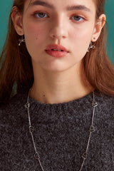 Knot ribbon drop surgical earring