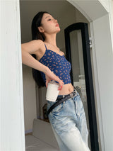 blue floral sleeveless top