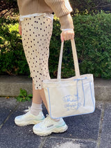 me abrace Canvas embroidered shoulder bag