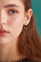 Knot ribbon drop surgical earring