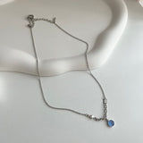 bi サージカルスチールブルーキャットアイコインハートキッチュネックレス / bi Surgical Steel Blue Cats Eye Coin Heart Kitch Necklace
