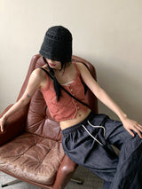 サリーボタンパンチングレイヤードニットノースリーブ / Sally button punching layered knit sleeveless