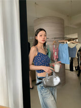 blue floral sleeveless top