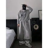 Huke x Nus. half zip-up