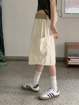 ポシカラーシャーリングポケットナイロンミディスカート / Poshi color shirring pocket nylon midi skirt