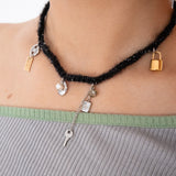 ウールニットユニークオブジェクトネックレス/Wool black knit with unique objects necklace
