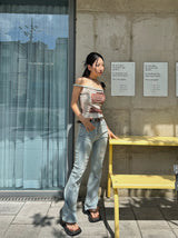 Belted light blue bootcut denim pants