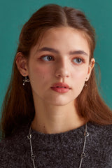 Knot ribbon drop surgical earring