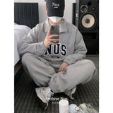 Huke x Nus. half zip-up