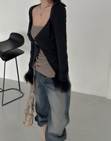 a sleeved bolero layered cardigan