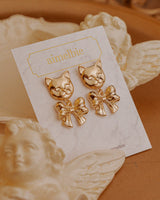 メルビーザキャットシリーズ - アドラーブルリボンピアス / Melbie The Cat Series - Adorable Ribbon Piercing