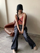 サリーボタンパンチングレイヤードニットノースリーブ / Sally button punching layered knit sleeveless
