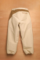 アシンメトリーウェーブパンツ / ASYMMETRIC WAVE PANTS-BROWN ECRU