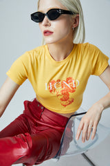 グラフィックプリントクロップドTシャツ / GRAPHIC PRINT CROPPED T-SHIRT