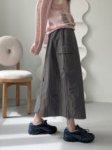 シネストリングナイロンカーゴバックスリットロングスカート / cine string nylon cargo back slit long skirt