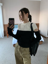 Black and white cut knit top