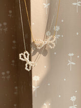 アイレットリボンパールピアス / [925silver] Eyelet ribbon pearl earrings